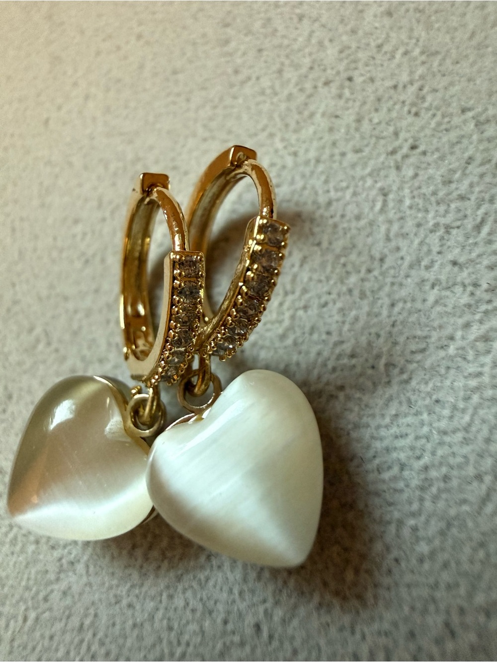 Gold Huggie Earrings with White Heart Dangles